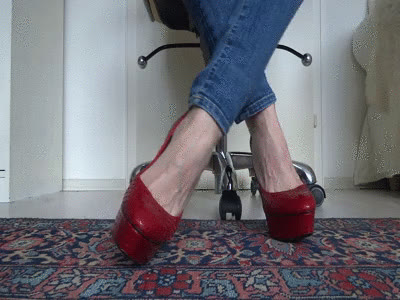 Lady Victoria Valente - Red platform designer high heels with extreme metal heels in close-ups